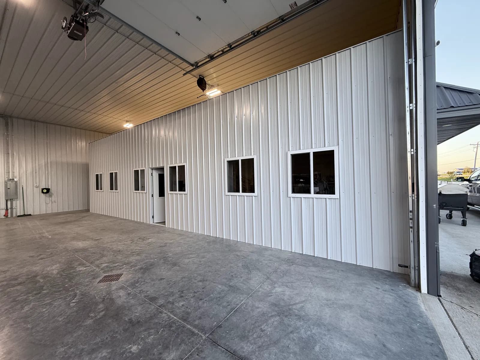 Finished post-frame interior with concrete floor by ORC in Johnson County