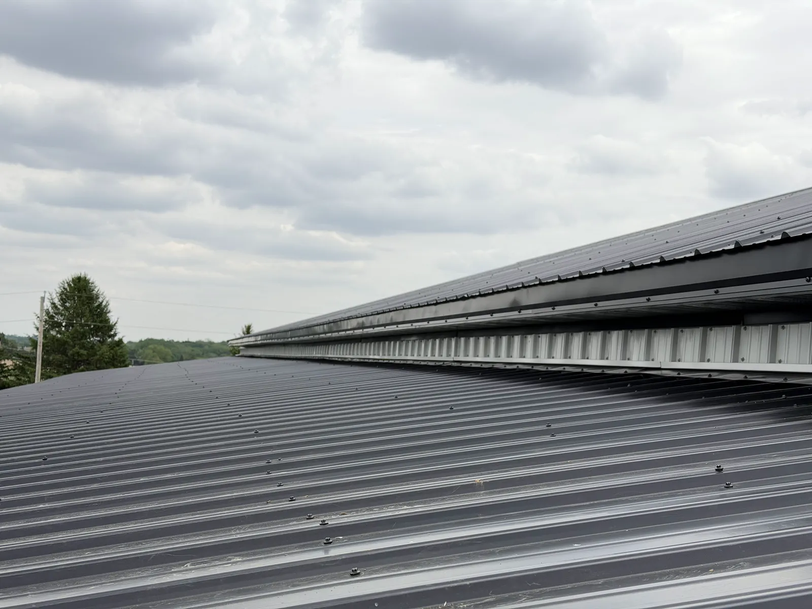 Metal roof ridge and trim detail by ORC in Davenport