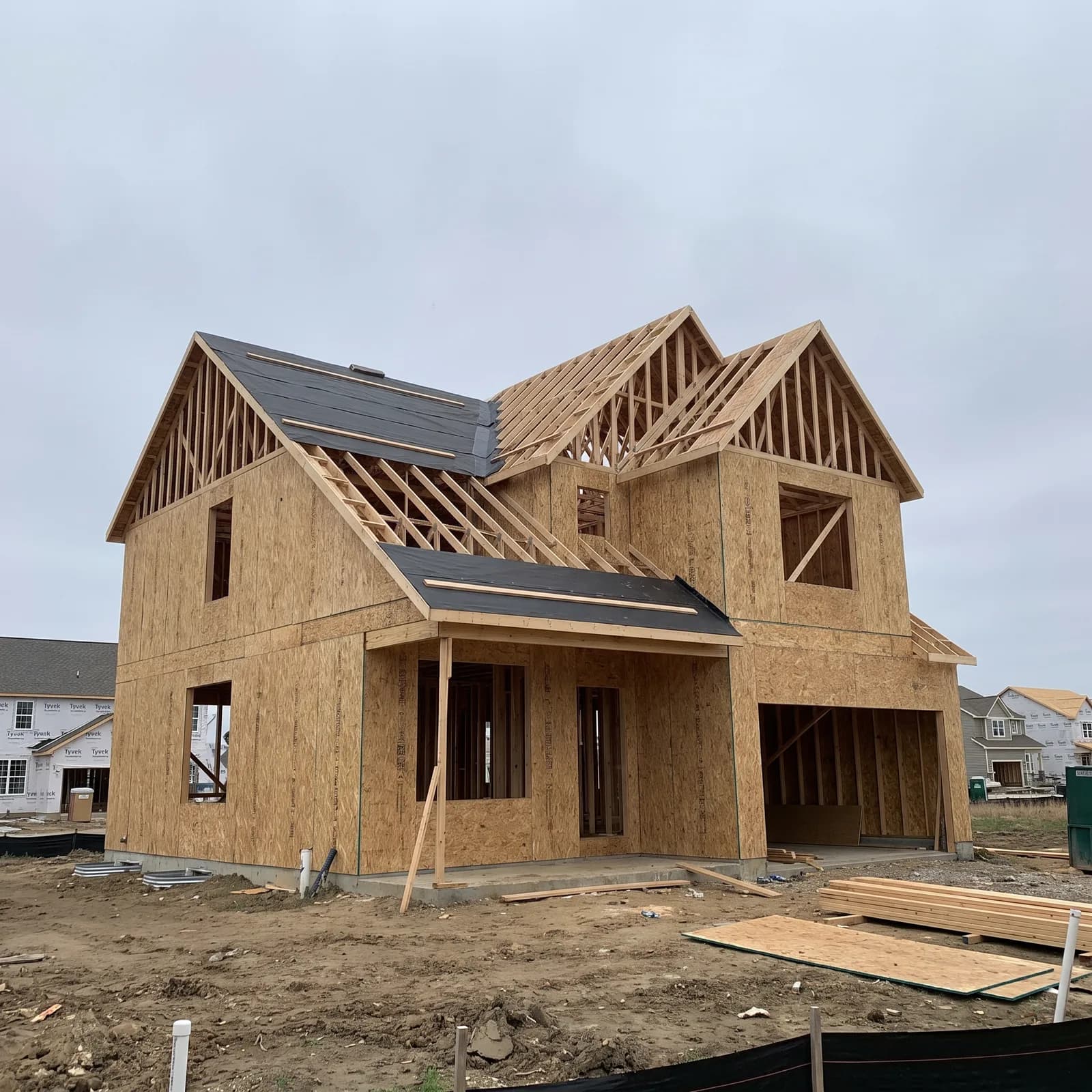 Two-story home framing and roof sheathing by ORC in Iowa City